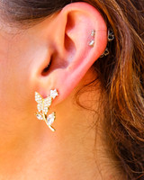 -Gold
-Butterfly detail
-Flower detail
-Lightweight
-Mini diamond detail 
GOLD BUTTERFLY FLOWER STUD
