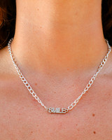 -Silver
-Chainlink design
-Smile detail
-Jeweled detail
-Choker
 SILVER SMILE CHOKER NECKLACE