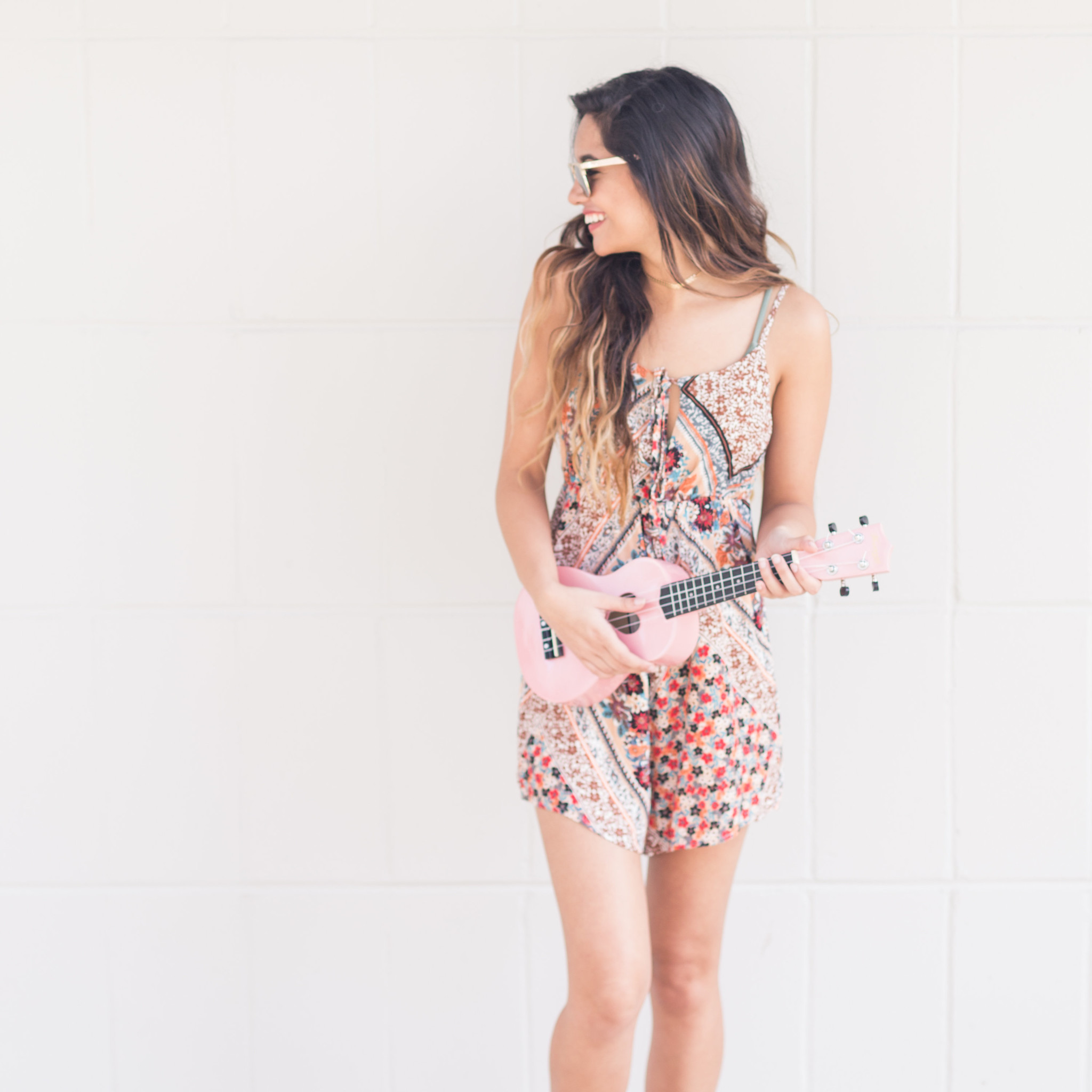 Girl playing the ukulele